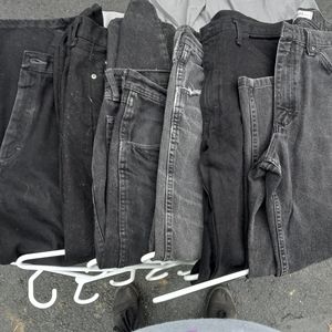 7 pairs of men's black jeans